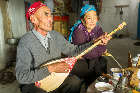 Ibek's father playing the dombra